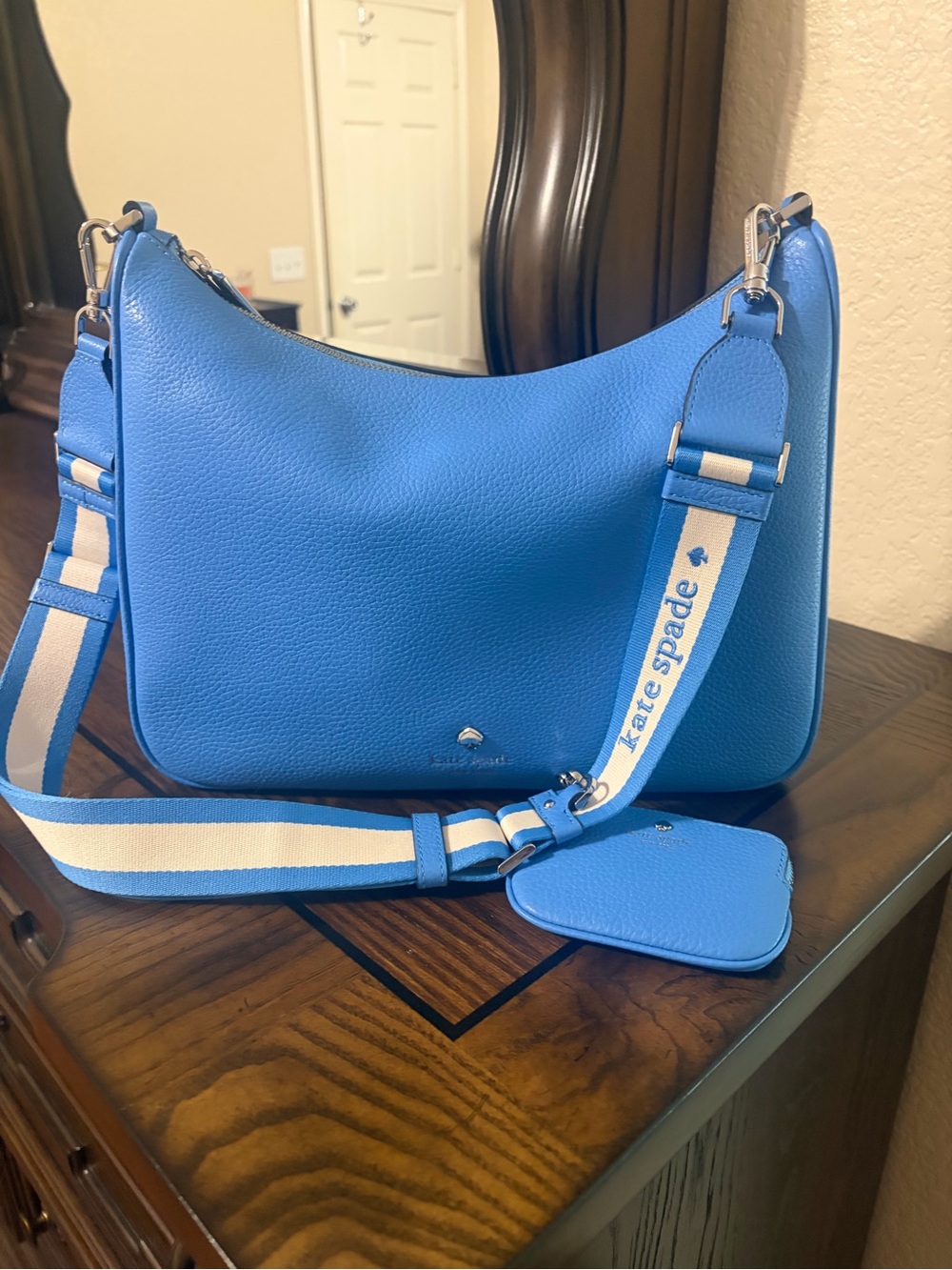 kate spade bright blue pebbled leather shoulder bag with striped removable strap